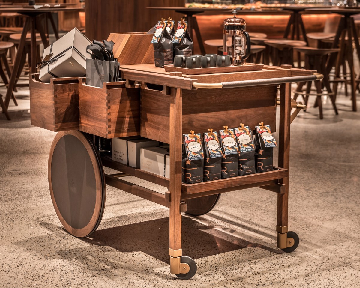 Wooden display trolley with coffee, bags and coffee equipment