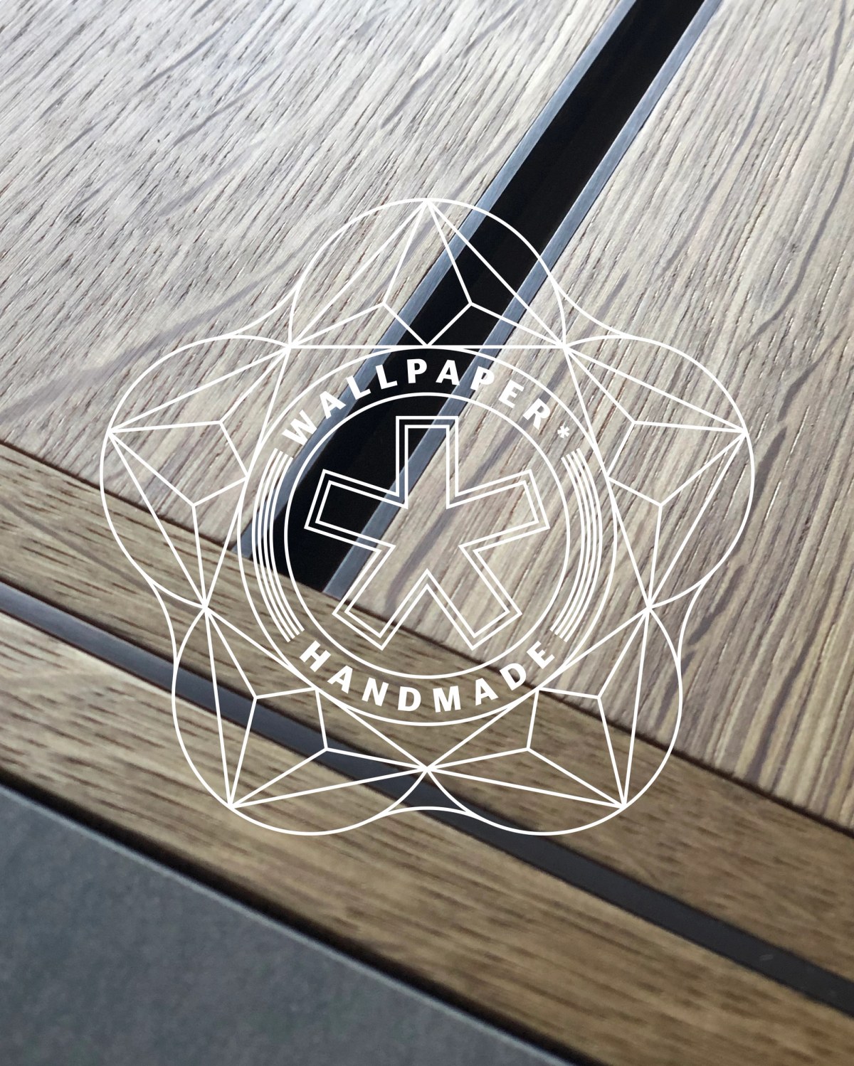 Wallpaper* Handmade logo on wood front