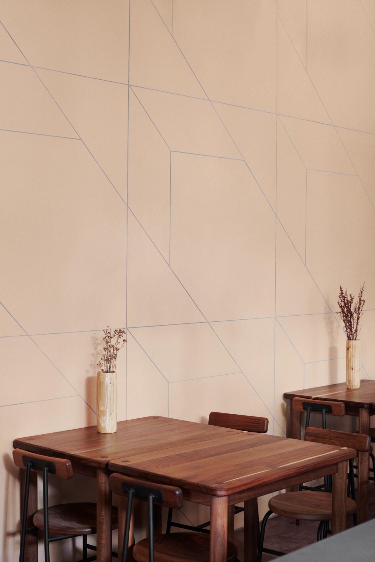 Light yellow tiled walls and dark wooden furniture 