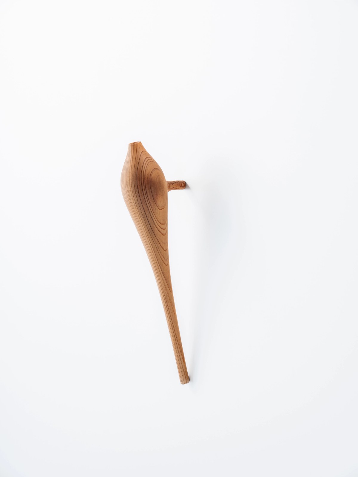 Wooden vase on wall 