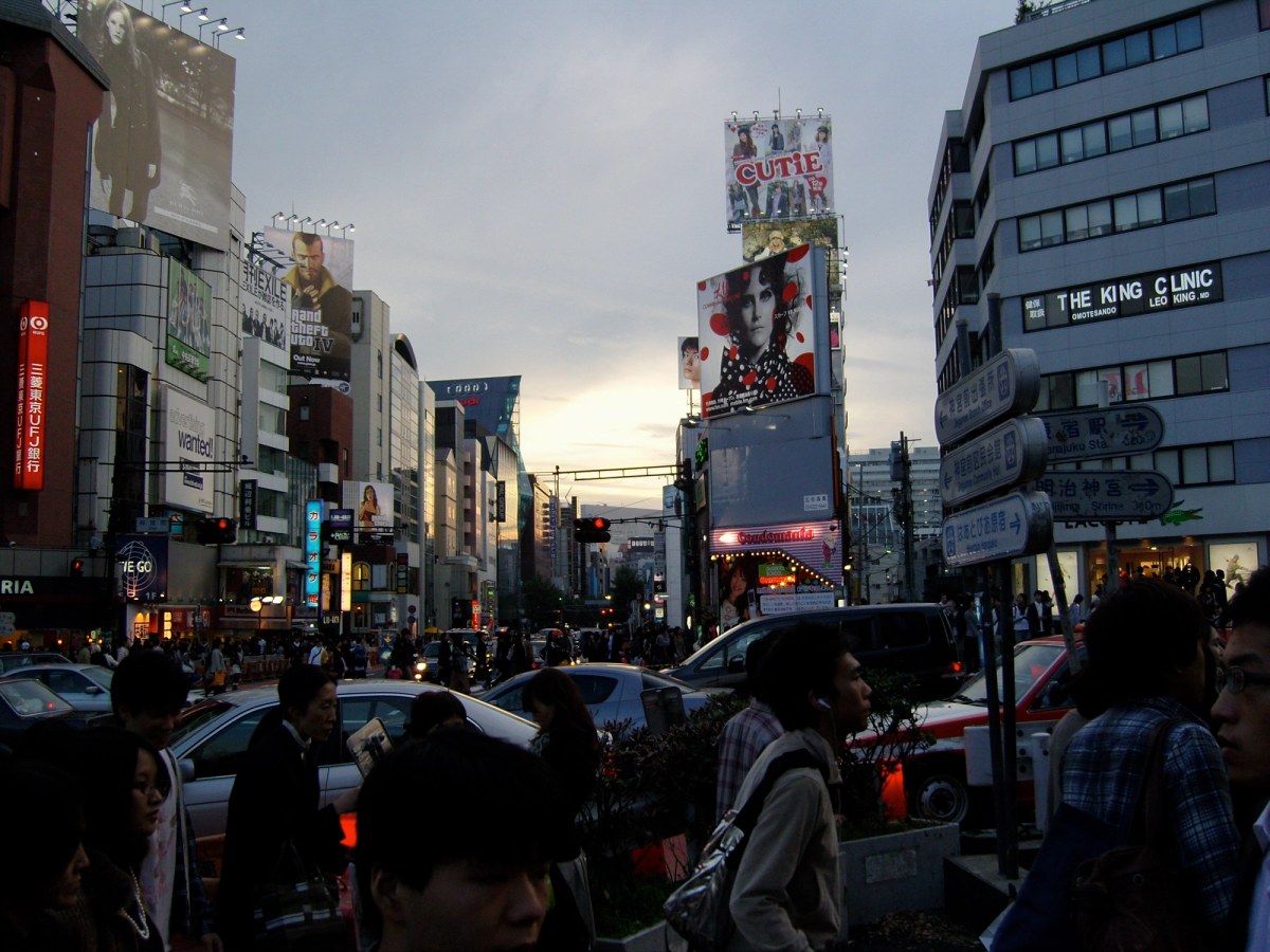 Street city view by dawn with cars and people walking