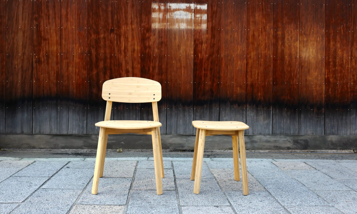 Bamboo chair and stool in front of Kyoto house 