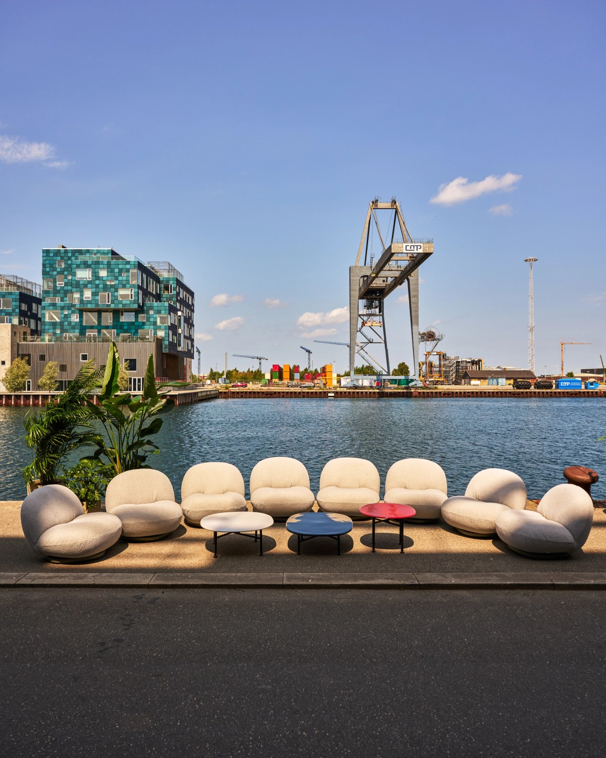 Big lounge chairs and coloured lounge tables by the Copenhagen Harbour front