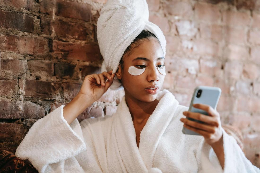 Spa guest booking her next visit from her phone