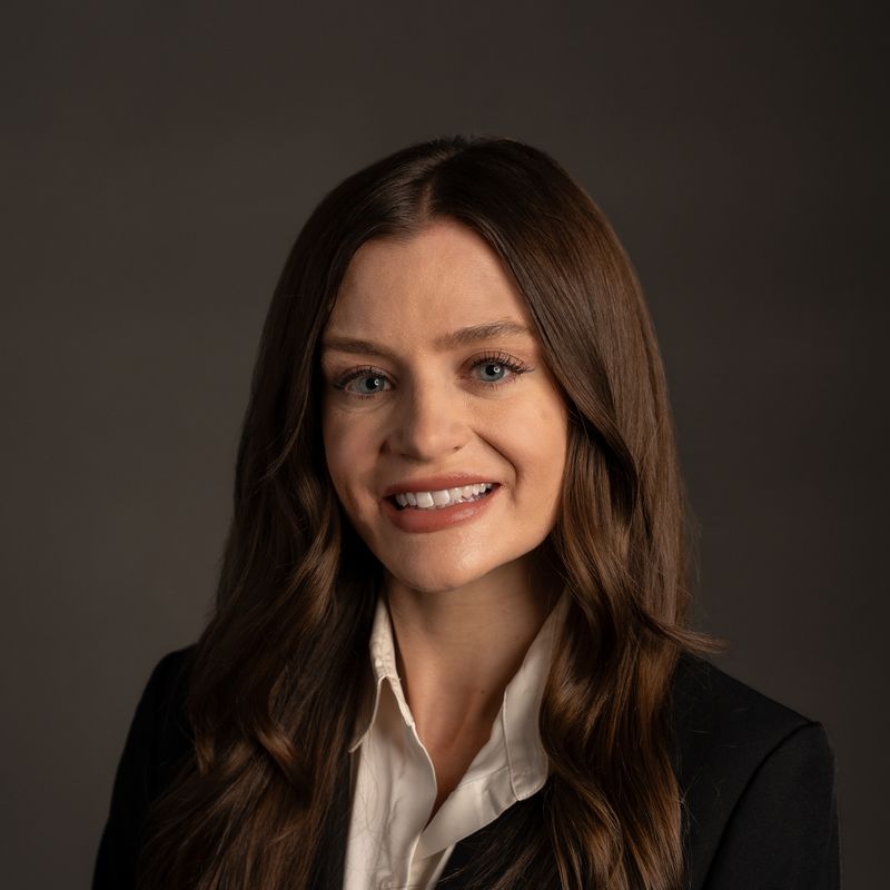 Caitlin E. Rams