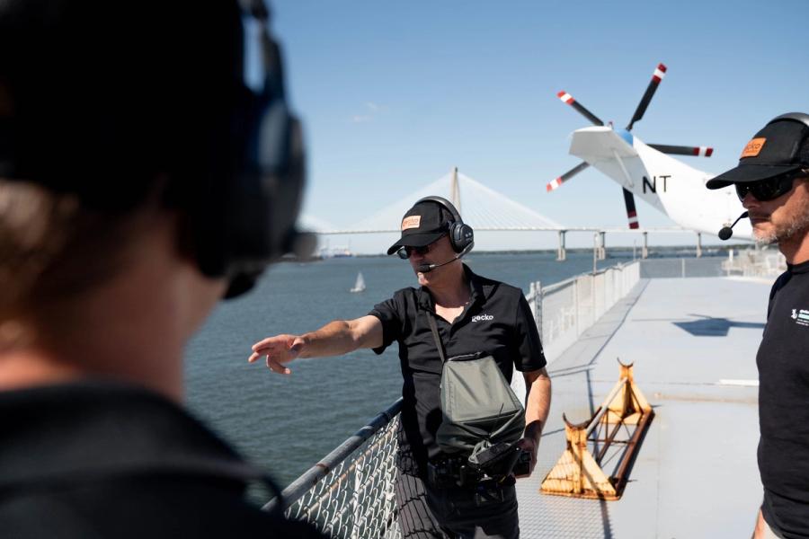 Gecko forward-deployed engineers on a ship deck