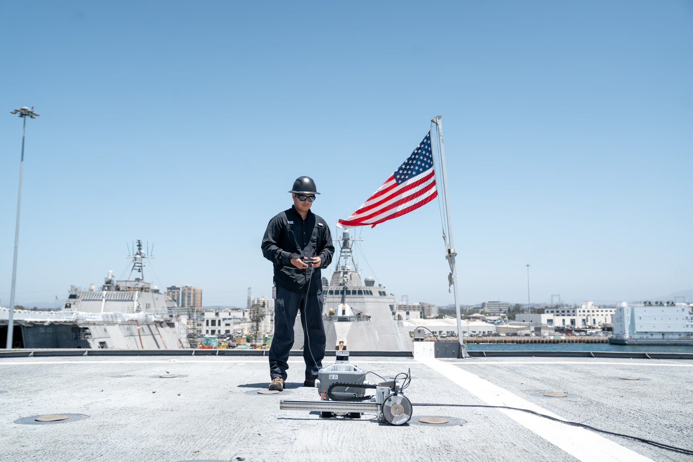 Gecko engineer operating Komodo on a ship deck