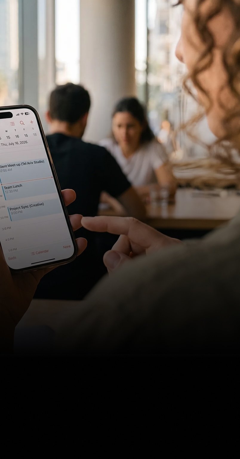 A business owner reviewing hio's suggested replies on their phone