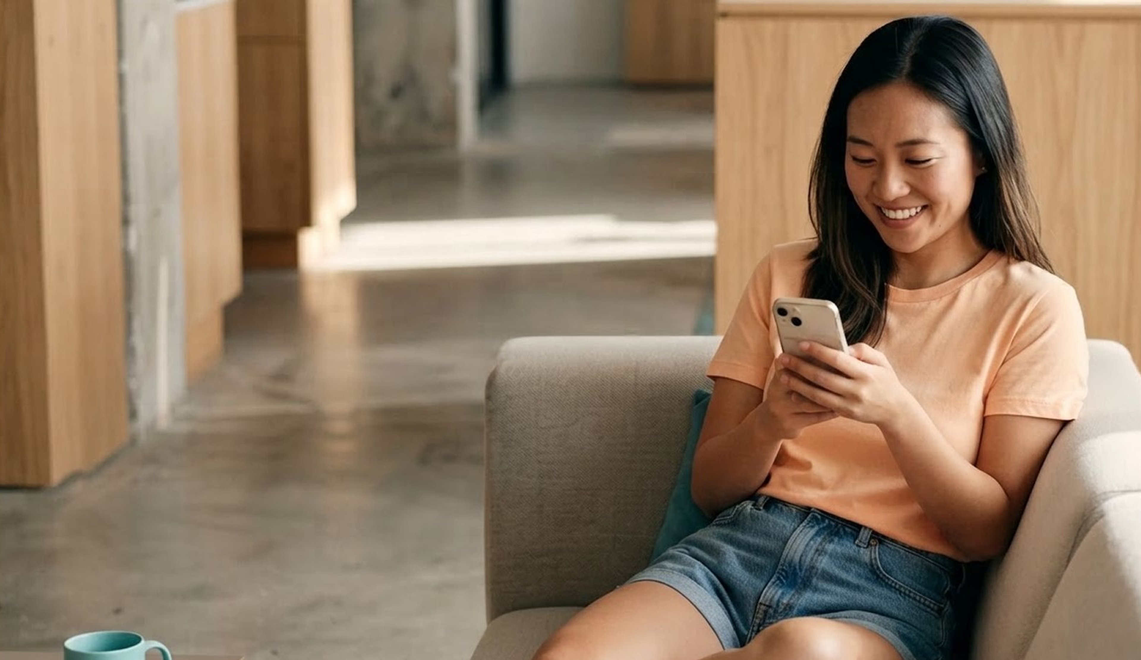 A business owner reviewing hio's suggested replies on their phone