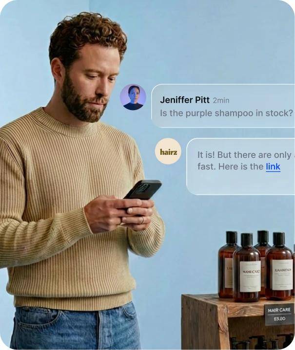 A small-business owner replies to Jeniffer Pitt on his phone