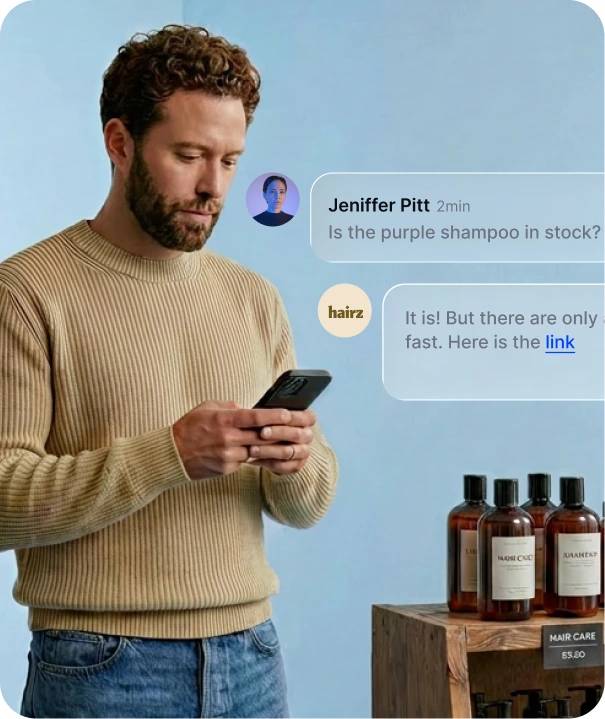 A small-business owner replies to Jeniffer Pitt on his phone