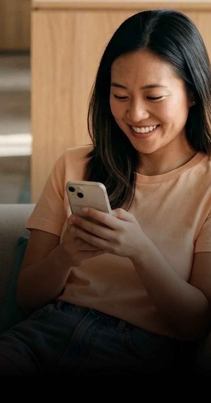 A business owner reviewing hio's suggested replies on their phone