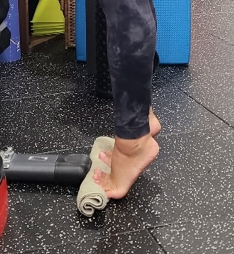 Calf raises on rolled towel 2