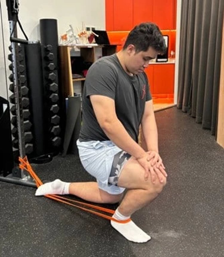 Figure 4: Banded ankle mobilisation into dorsiflexion