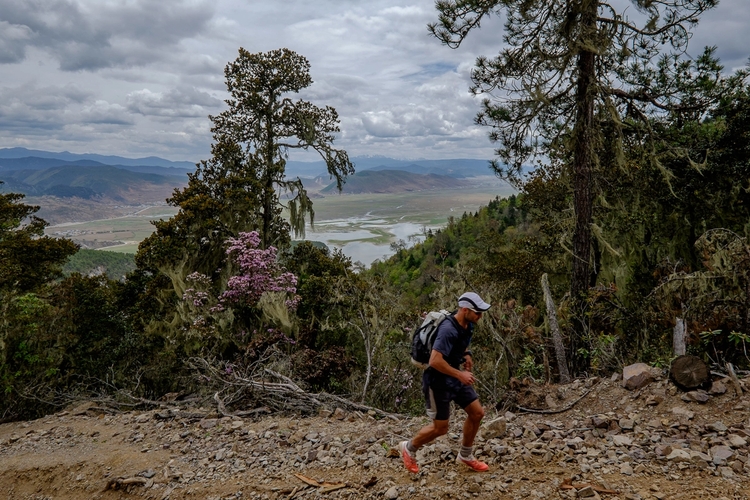 Climbing up from Shangrila Plain into the forested mountains