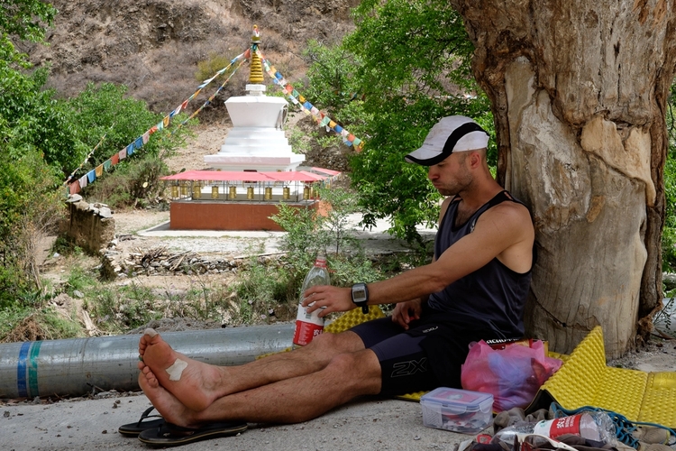 Having a snack by a Buddhist pagoda