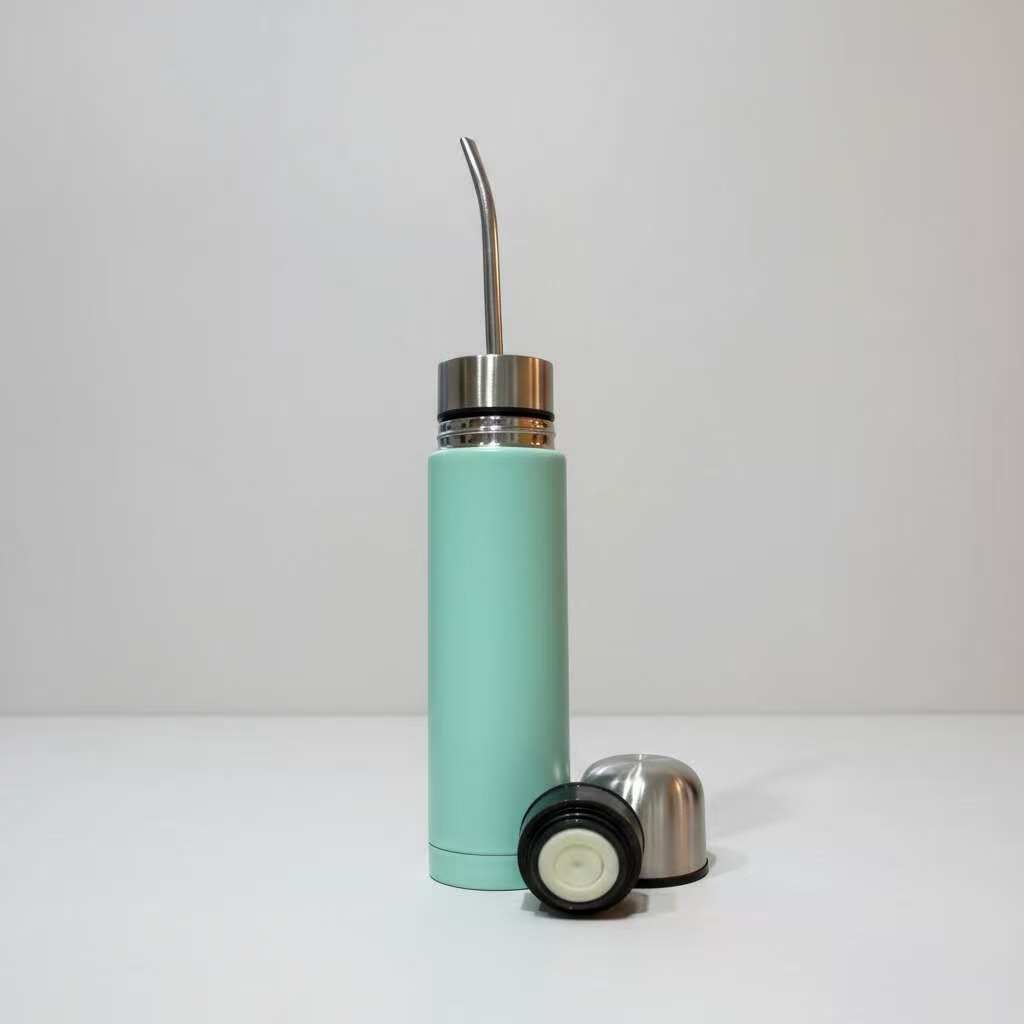 Mint green stainless steel yerba mate travel bottle with metal straw and cup lid