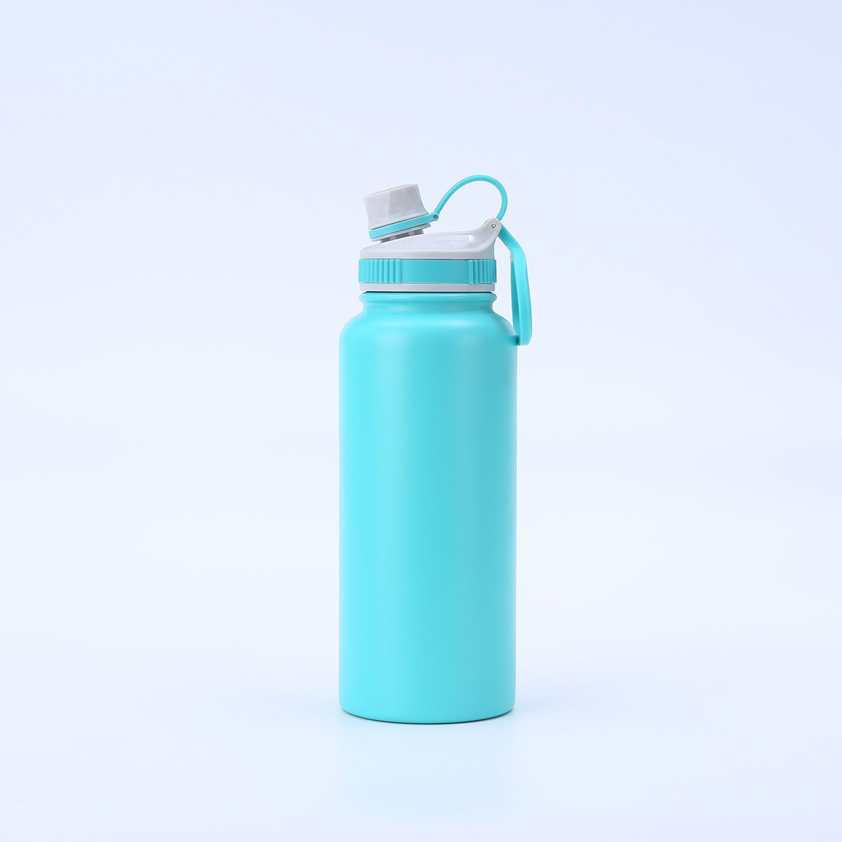 Peacock blue 32oz insulated bottle with spout lid and carry handle