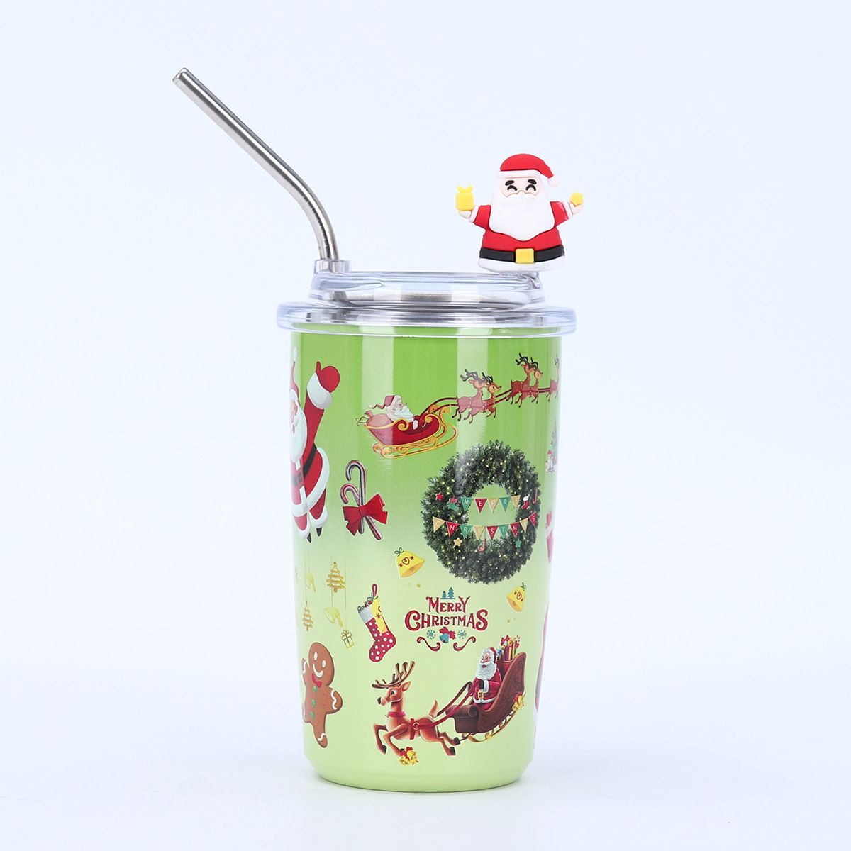 Light green 460ml Christmas tumbler with metal straw and Santa sleigh UV printed design