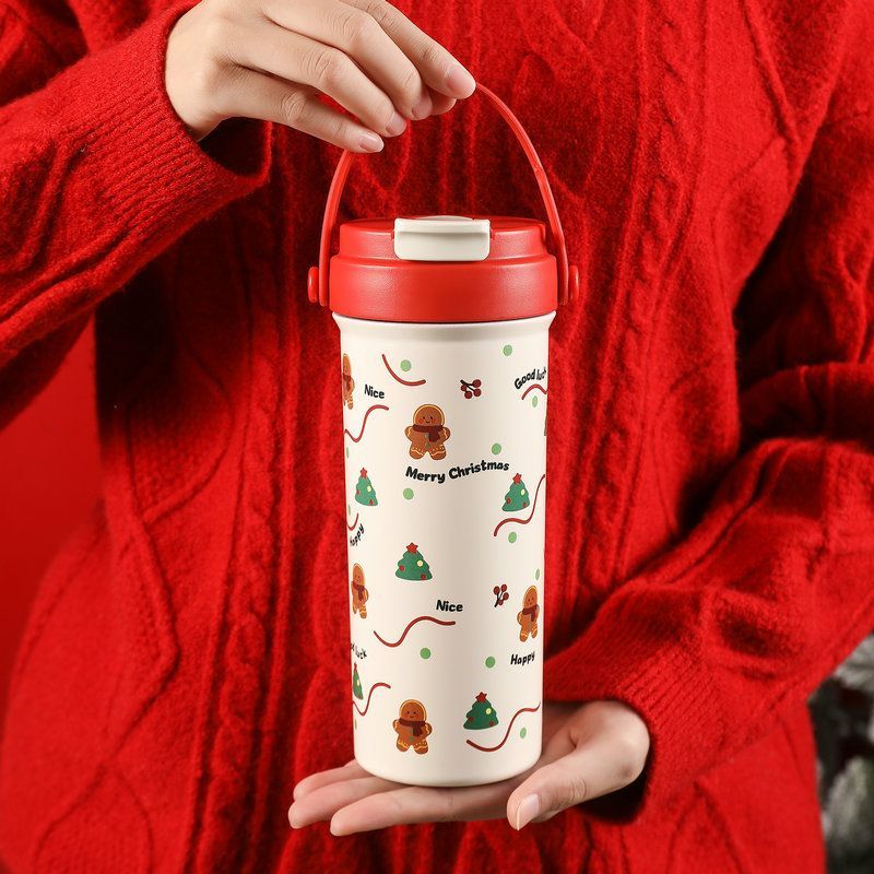 Cream 600ml Christmas tumbler with red handle and gingerbread tree UV printed pattern