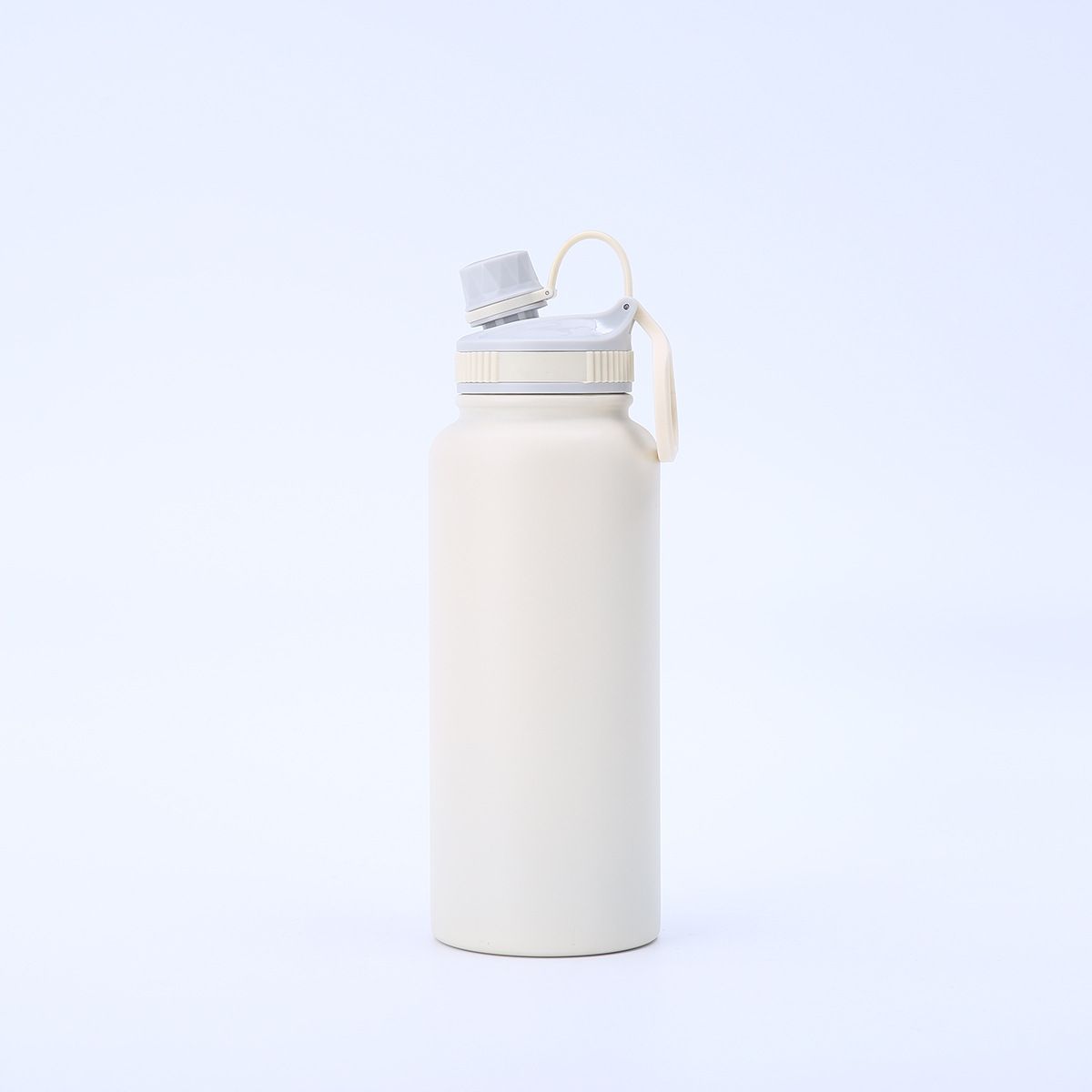 White 32oz insulated bottle with spout lid and carry handle