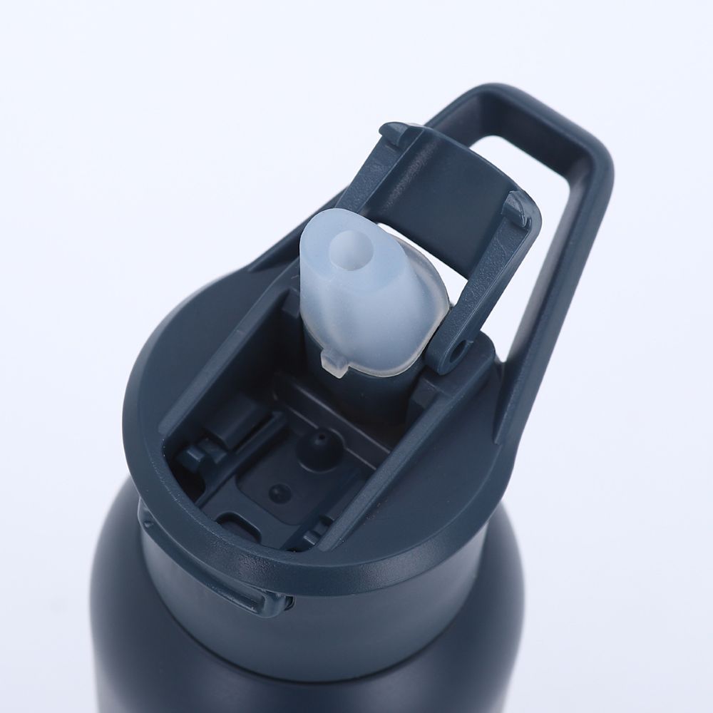 Open straw lid detail of stainless steel vacuum bottle with carry handle