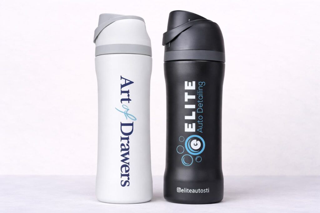 White and black custom stainless steel sport bottles with UV printed logos on a light background