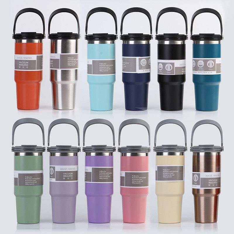 Vacuum insulated coffee mug with handle showing sleek modern design and logo area