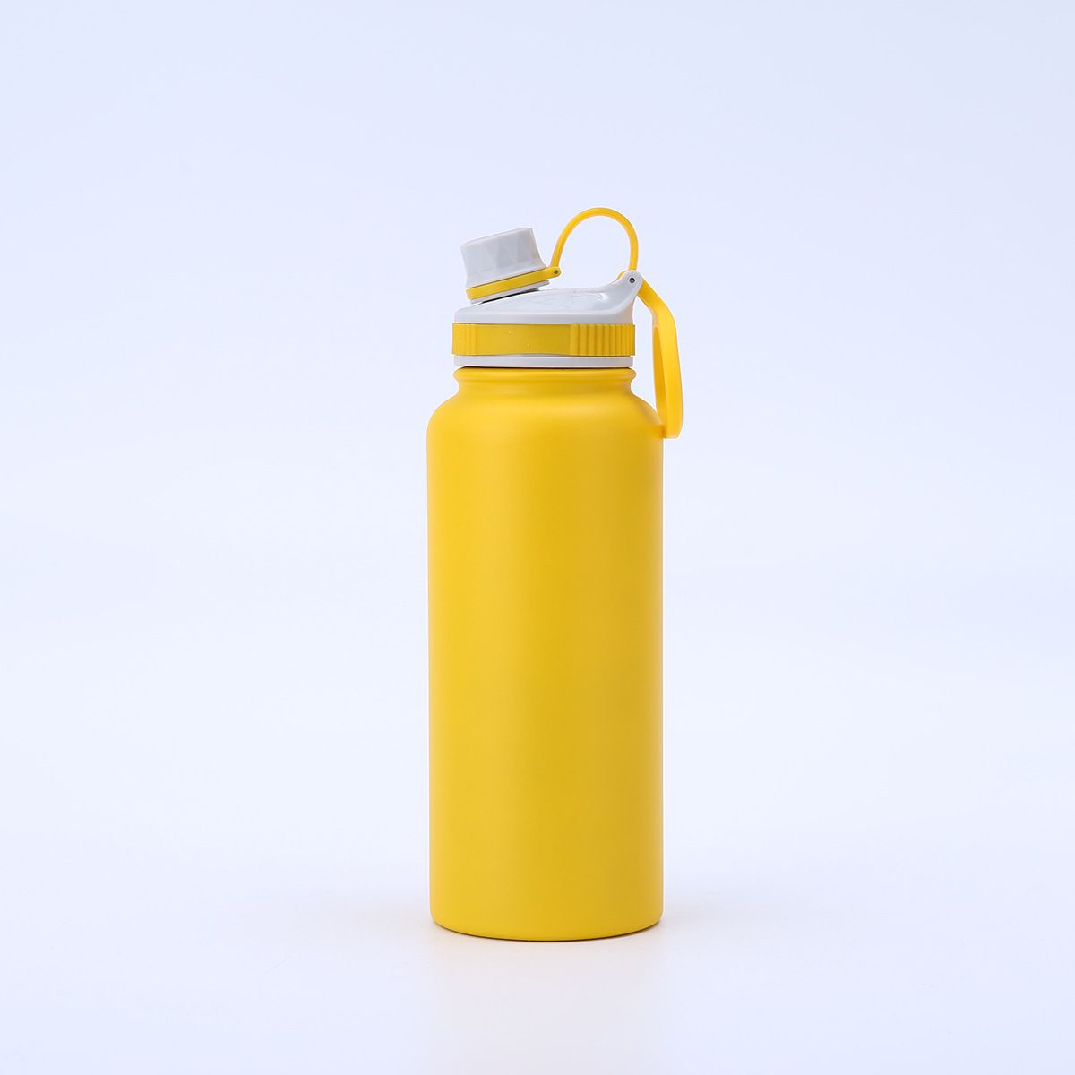 Yellow 32oz insulated bottle with spout lid and carry handle