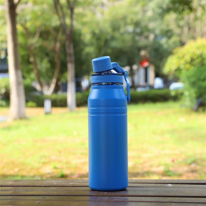 blue vacuum insulated water bottle with handle