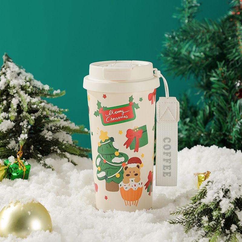 17oz Christmas coffee tumbler with white strap and cute tree bear holiday artwork