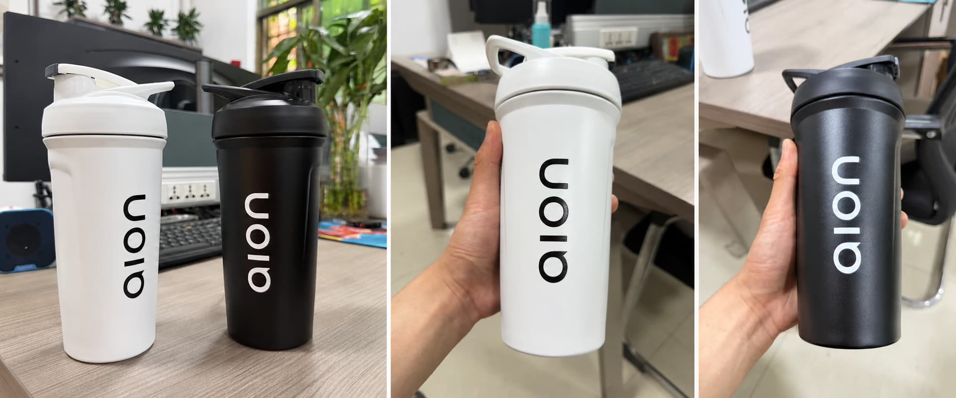 Custom 24oz 316 stainless steel protein shaker cups in black and white with single-color 3D logos, shown as sample cups for a U.S. fitness brand gift project