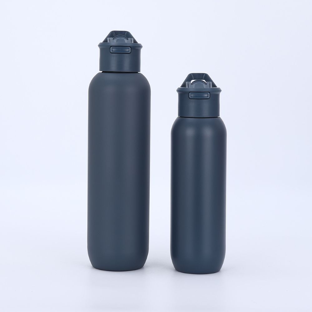 Dark blue vacuum sports bottles with handle straw lids in two sizes