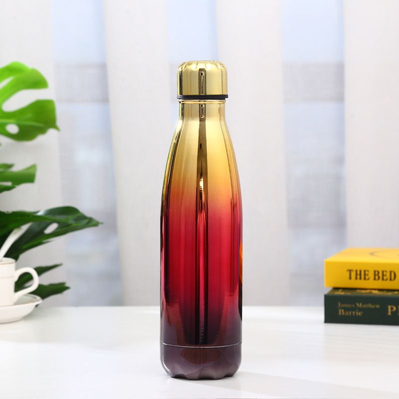 Red-to-gold gradient electroplated 17oz cola-shaped insulated bottle