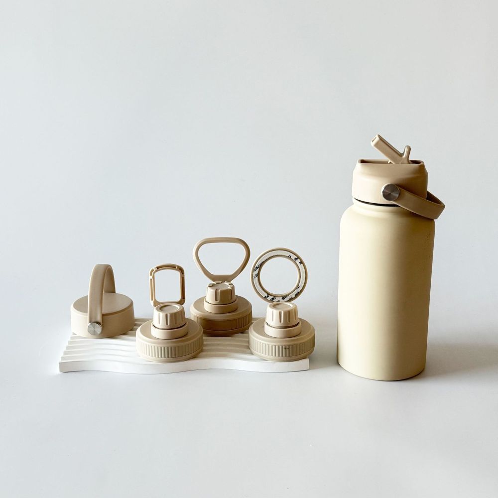 Custom color stainless steel insulated bottle with interchangeable lids