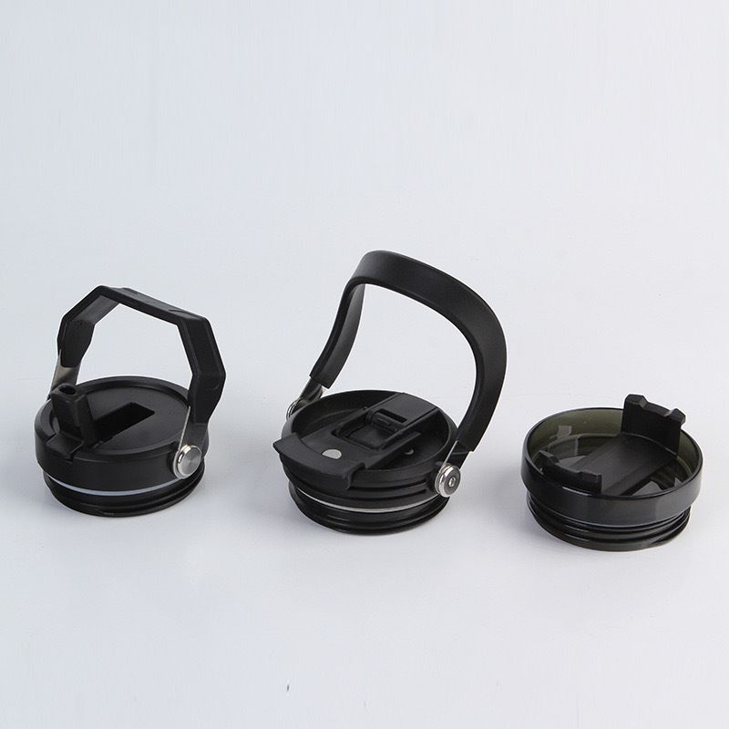 Three interchangeable lid styles for 30oz stainless steel mug flip lid, straw lid, and slider lid.