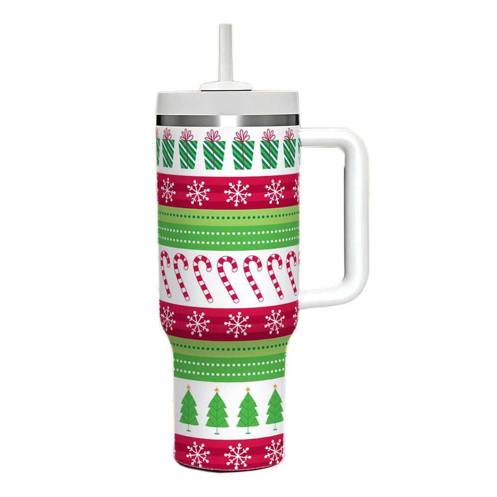White 40oz Christmas tumbler with handle and striped holiday pattern featuring candy canes and snowflakes