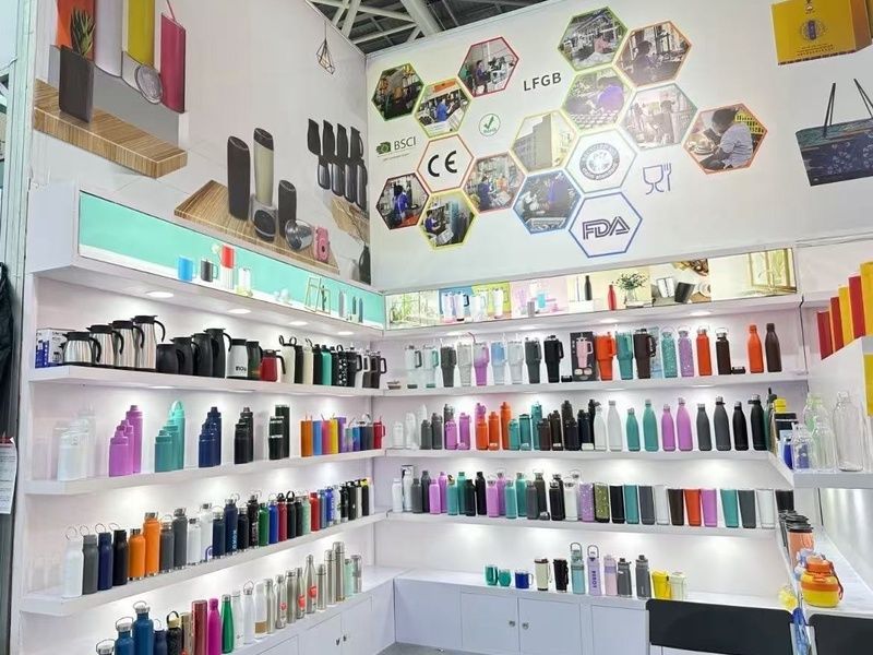 OEM showroom displaying custom stainless steel bottles and drinkware samples