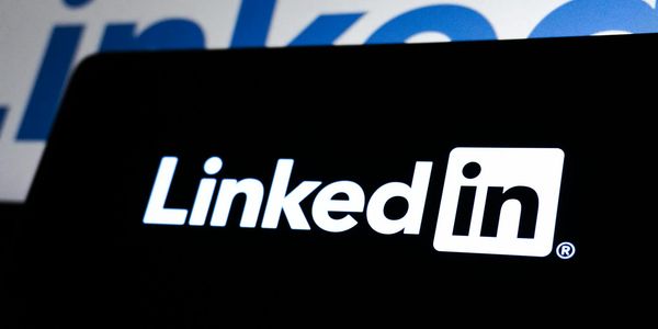 High contrast image of LinkedIn logo displayed prominently on a dark screen.