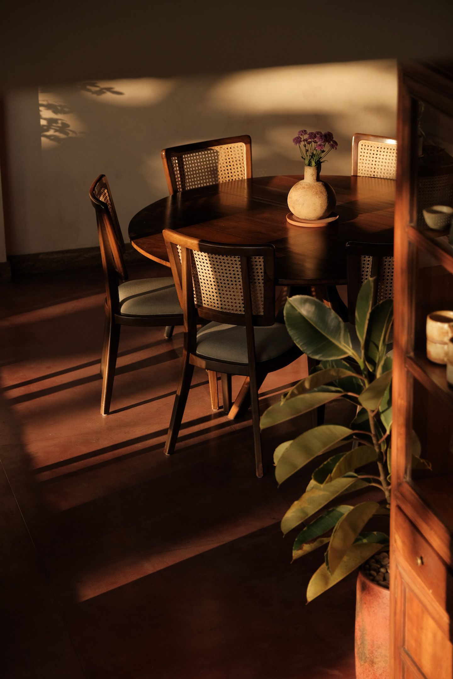 Sunlit dining room with rattan chairs at House of Sunday, Canggu