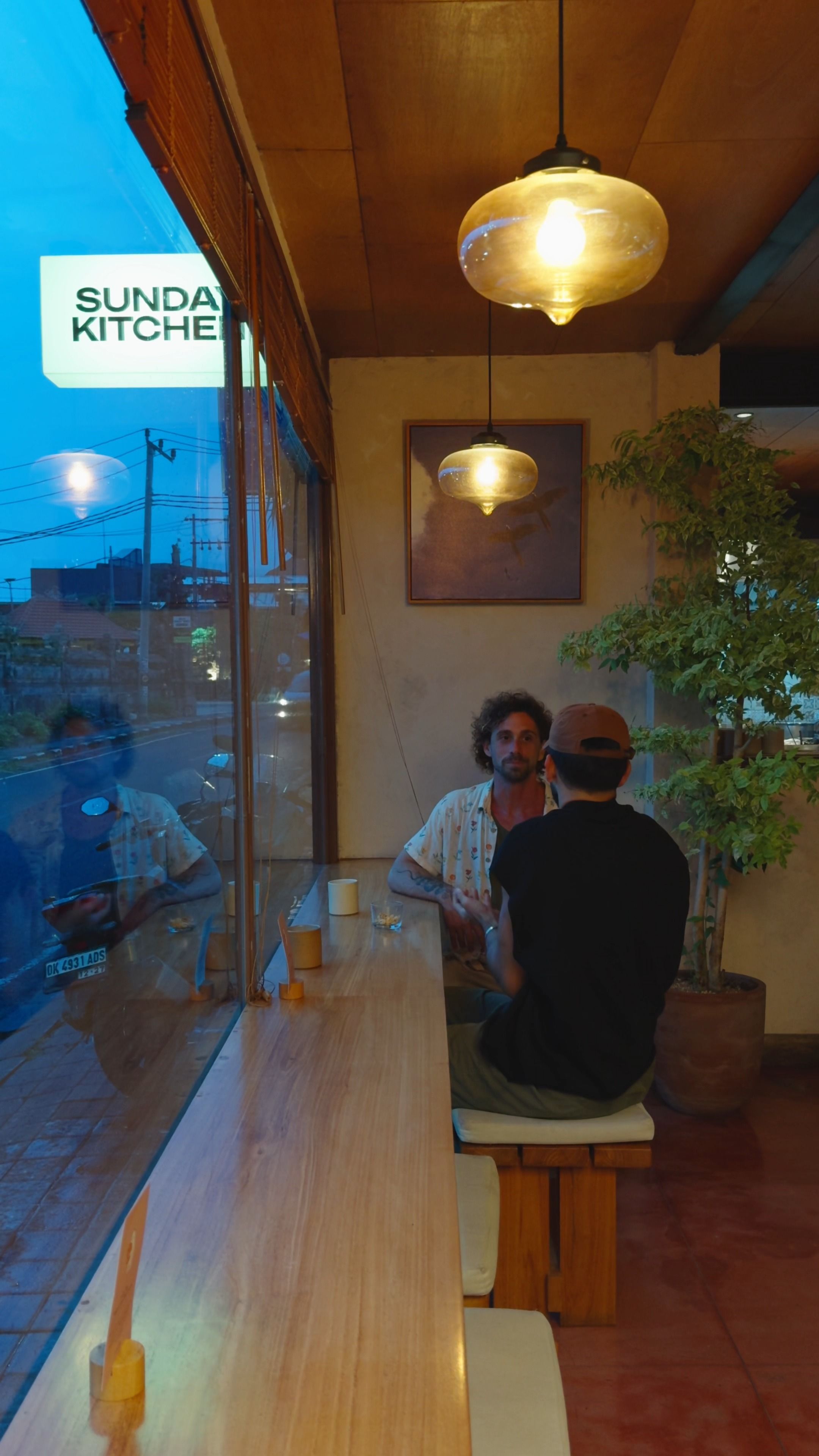 House of Sunday storefront at night on Batu Bolong, Canggu