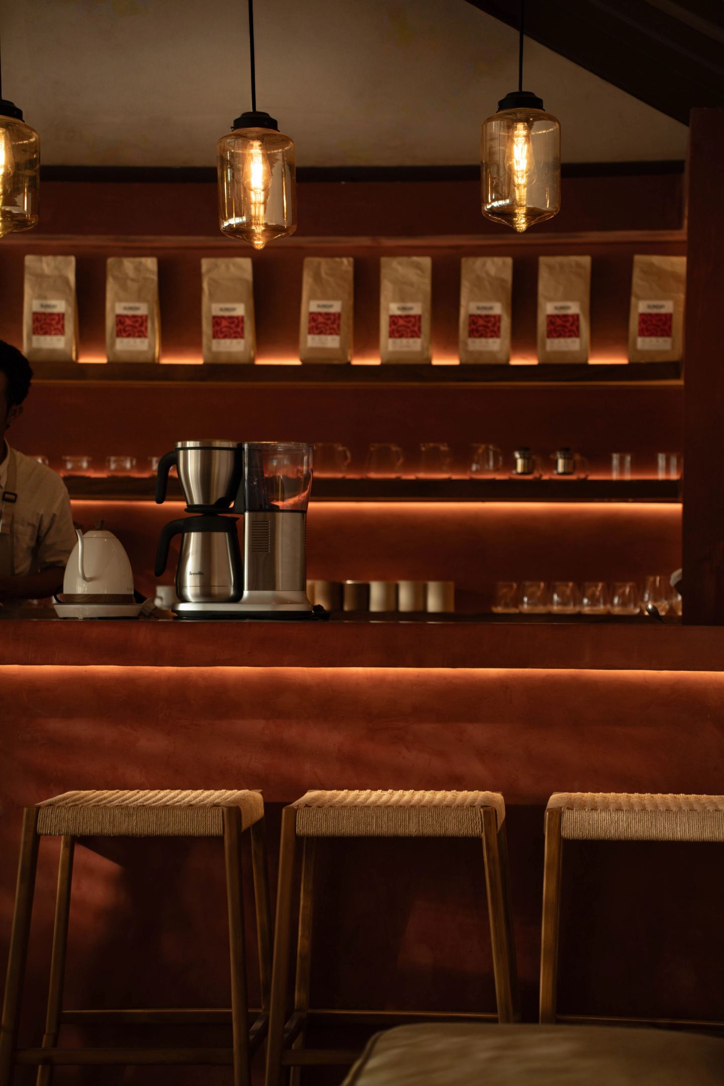 Specialty coffee bar with roasted beans on display at House of Sunday, Canggu