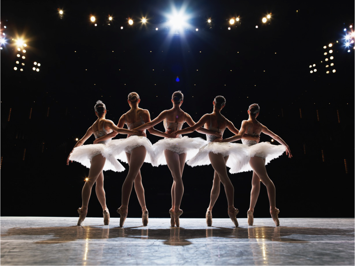 Choreography — dancers follow shared rules without a conductor