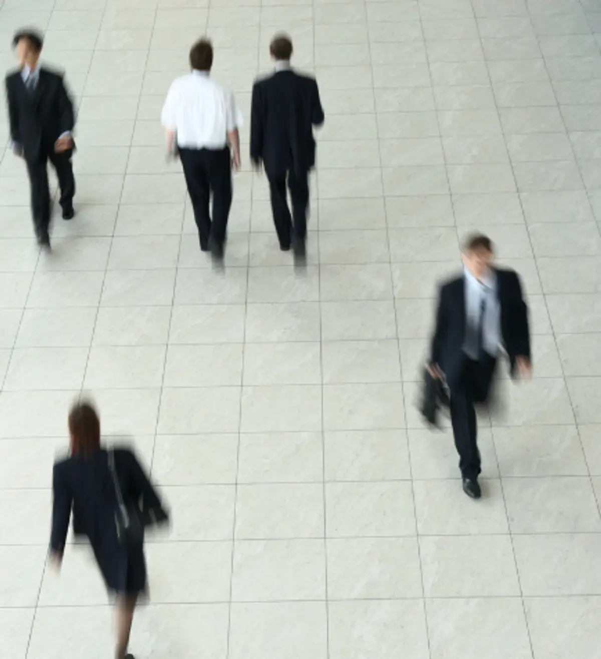 man drinking coffee taking notes