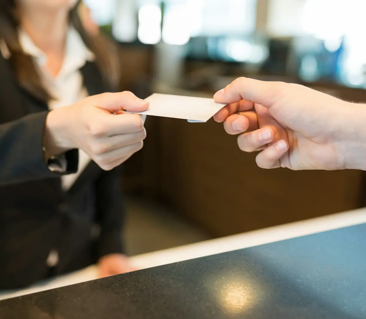 receiving room key at reception