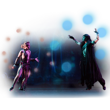 Two performers in dramatic costumes reach toward each other on a stage lit with blue and orange circles.