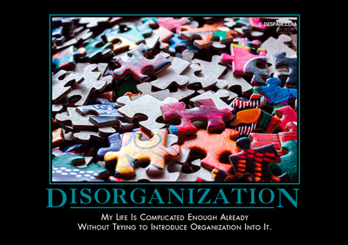 a stock image of puzzle pieces, with the text "Disorganization" beneath it