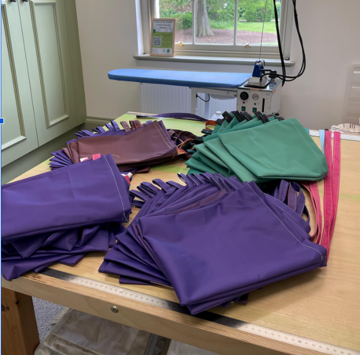 Carried with care: 560 drain bag carriers for cancer patients, made from exhibition leftovers