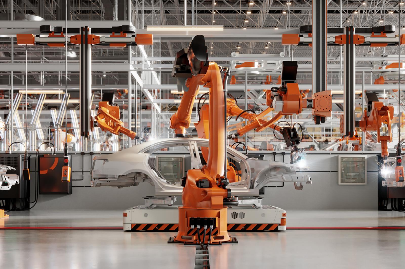 A robotic arm manufacturing cars in an industry 4.0 factory