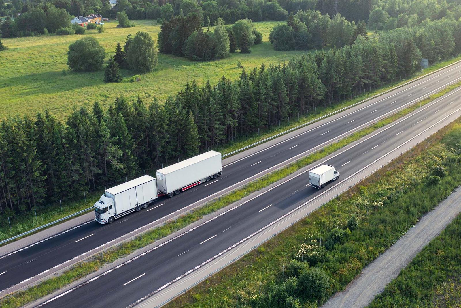 A truck drives down a highway